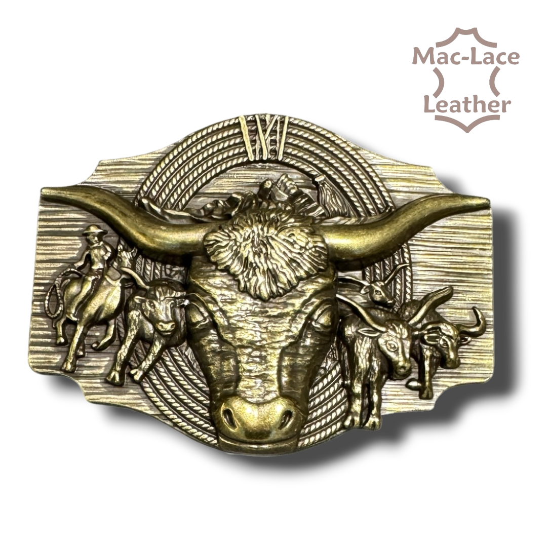 Brass trophy buckle featuring an embossed longhorn bull and Western rodeo design.